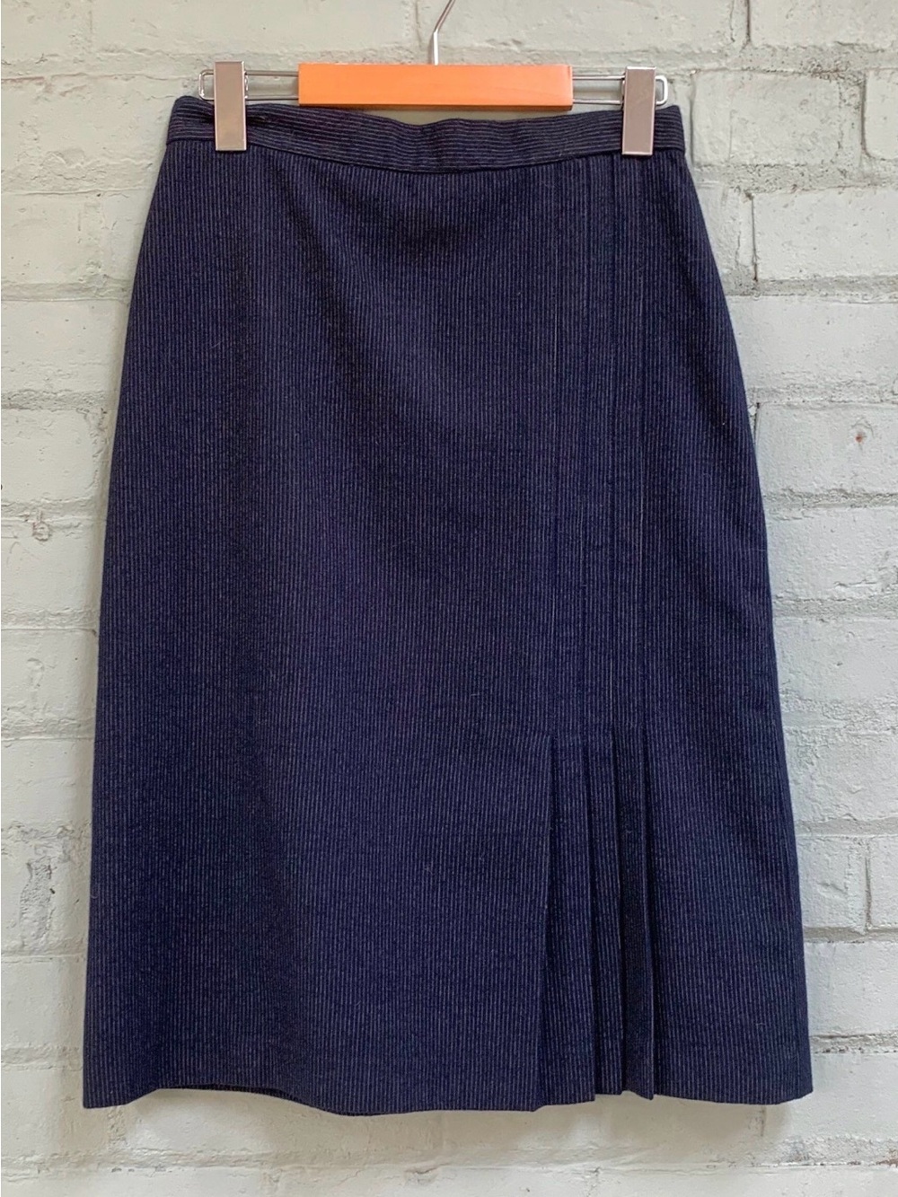 Navy Midi Pencil Skirt with Pleated Hem Detail and Pinstripes